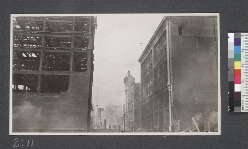 Ruins of the "fire proof" buildings on Grant Avenue, April 20th, 1906. View from Market. [View is of Stockton St., not Grant Ave.]