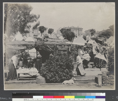 [Makeshift businesses : House of Mirth restaurant (?) and Two Orphans barber shop. Refugee camp no. 16, Jefferson Square. No. 112.]