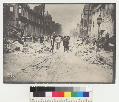 McAllister and Market Sts. Hibernia Bank. Hall of Records, City Hall between. No. 33. [Men clearing debris from street.]