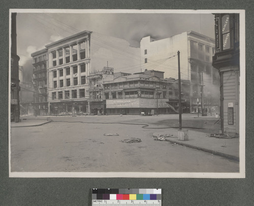 [Intersection of Golden Gate Ave. and Taylor St. at Market. Hale Bros. Inc. department store, left and right of center.]