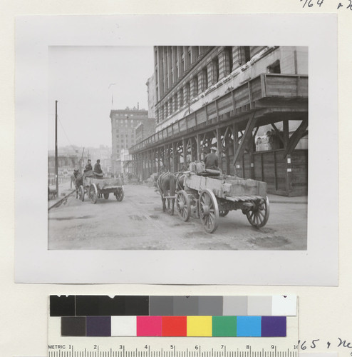 [Scene along Montgomery St. from Bush. Mills Building, right.]