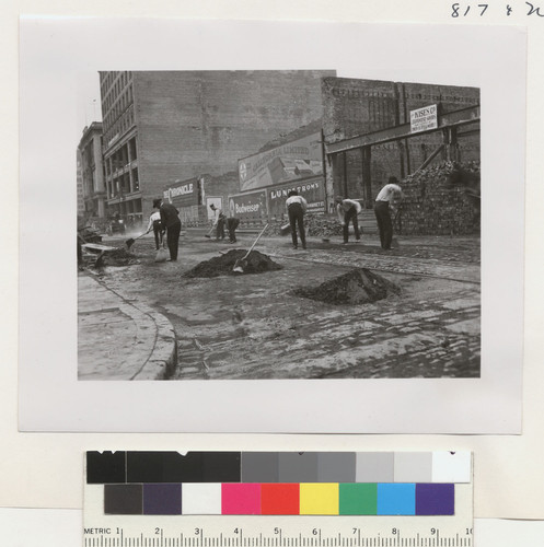 [Street cleaning scene. Unidentified location.]