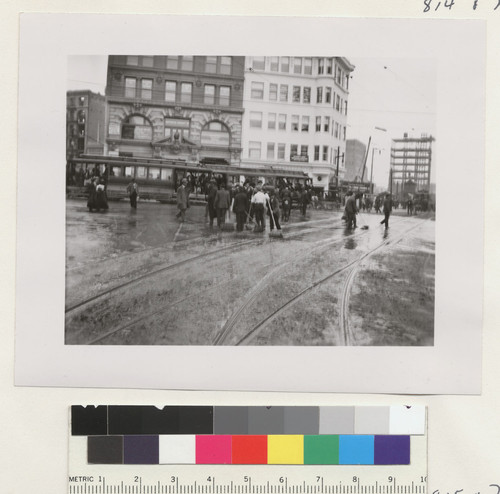 [Street cleaning scene. Market St.?]