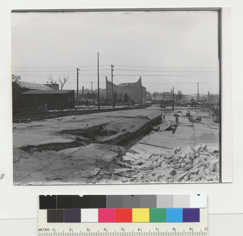 [Subsidence along Capp St. Temporary rail running center to left.]