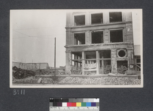 Stuart [i.e. Steuart] and Market Streets. This shows where Market Street has sunk over four feet and Stuart [sic] Street has not sunk at all, also shows the Steam R.R. cars track laid down Market Street for the purpose of hauling the debris from the City. May 25, 1906