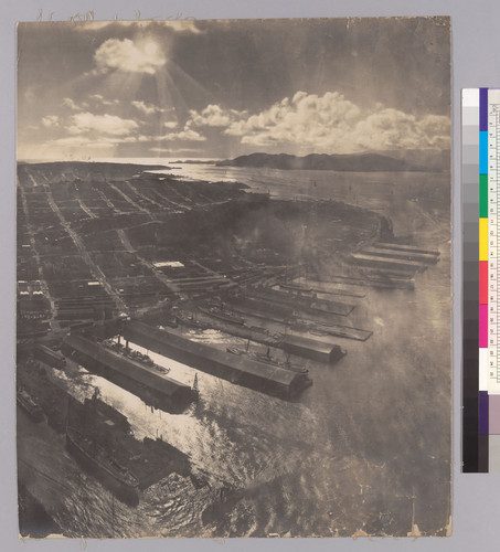 Photograph of San Francisco in Ruins, from Lawrence Captive Airship, 2000 Feet Above San Francisco Bay Overlooking Waterfront. Sunset over Golden Gate. [Right panel.]