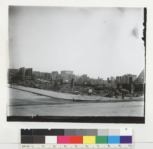 [View from Market St. (?) looking north to Nob Hill and Fairmont Hotel in distance.]