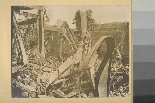 [Twisted steel among ruins.]