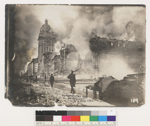 [View east down Market St. from near Stockton and Ellis Sts. during fire. Police [or National Guard?) officers patrolling street; Call Building, left center.] [No. 109]