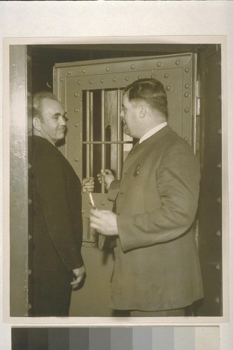 [Tom Mooney and unidentified man at cell door, San Francisco Jail. 1933.]