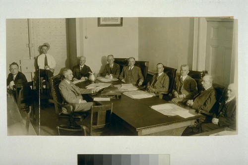 [Pardon hearing for Warren K. Billings. August 15, 1930. Left to right: court reporter, Warren K. Billings, Justice John Preston, court reporter, Chief Justice Waste, Justice Seawell, Justice Schenk, Justice Curtiss, Justice Langdon. Photograph by Howard Robbins. Glued to No. 02856b]