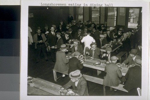 Longshoremen eating in dining hall