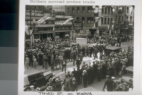 Strikers surround produce trucks, Third Street near Minna