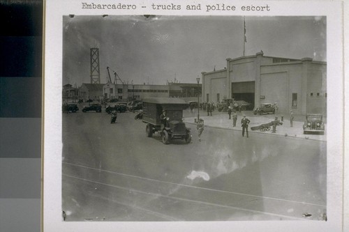 Embarcadero - trucks and police escort