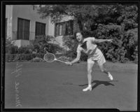 Merrie Pfluger plays badminton in the athletic department of the California Women of the Golden West, Los Angeles, 1935