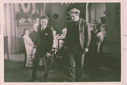 Motion picture still of Charlie Chaplin and Will Rogers