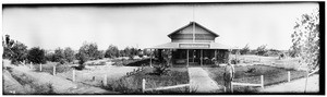 Panoramic view of the exterior of the Imperial Investment Company in the Imperial Valley