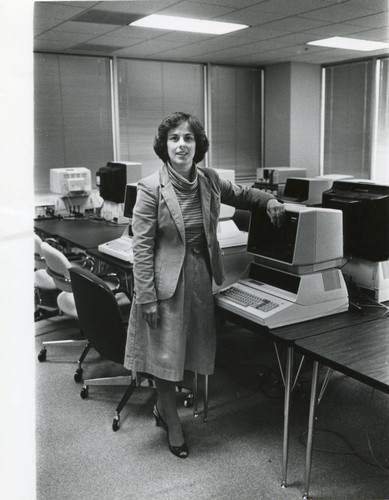 Photograph of a Staff Member at her computer