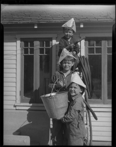 Boys playing fireman, Los Angeles, circa 1935