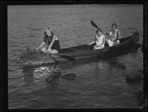 Women and girl in canoe, Lake Arrowhead, 1929