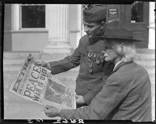 Veterans Robert W. Renton and George L. Grimston with 1918 newspaper, Los Angeles, 1928 or 1930