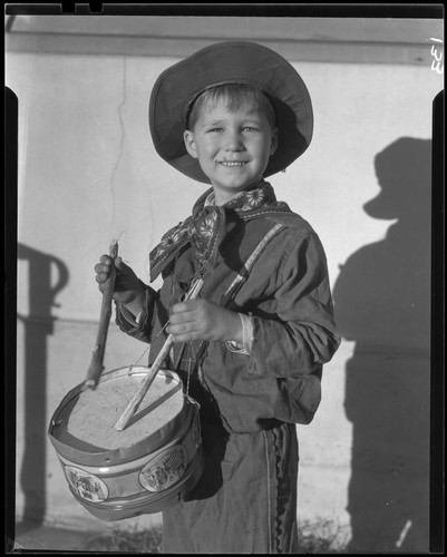 Boy with toy drum, Los Angeles, circa 1935