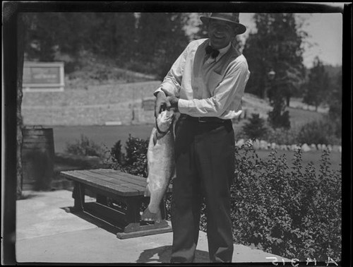 Man with trout, Lake Arrowhead, 1929