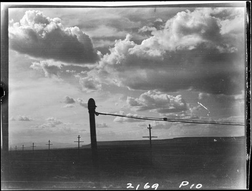 Clouds and utility poles, Kansas, Colorado, or New Mexico, 1925