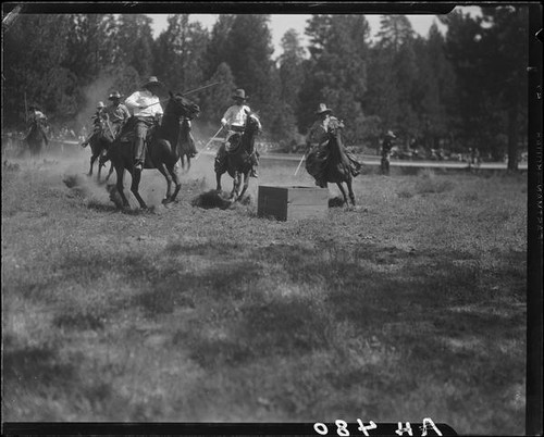 Rodeo riders performing, Lake Arrowhead Rodeo, Lake Arrowhead, 1929