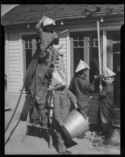 Boys playing fireman, Los Angeles, circa 1935