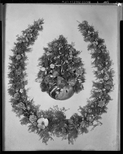 Horseshoe-shaped shell art wreath made in 1888 by poet Ina Donna Coolbrith, Santa Monica, 1953