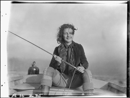 Sally Phipps in boat fishing, Lake Arrowhead, 1929