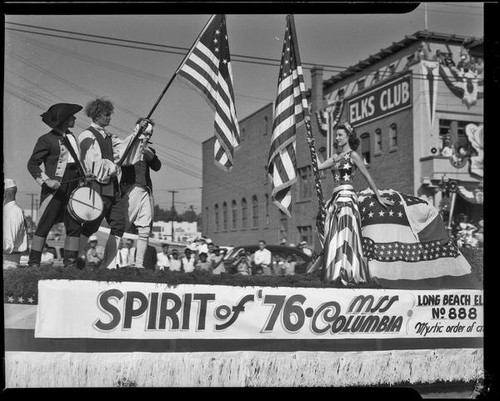 Float titled "Spirit of '76," sponsored by Long Beach Elks, passing Elks building, Elks' parade, Santa Monica, 1939 or 1952