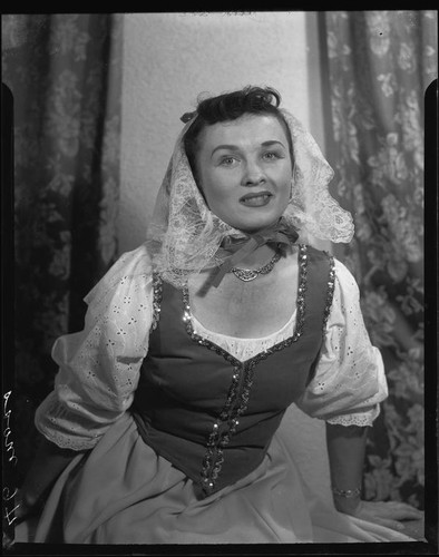 Opera performer June Moss in a dirndl costume and lace veil for the opera Martha, Santa Monica