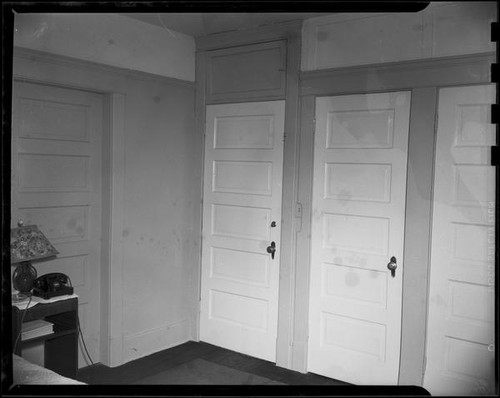 Hotel room with three doors in Windemere Hotel, Santa Monica, 1955