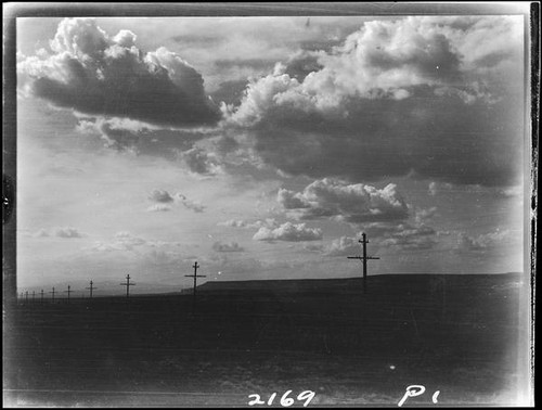 Clouds and utility poles, Kansas, Colorado, or New Mexico, 1925