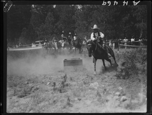 Rodeo rider performing, Lake Arrowhead Rodeo, Lake Arrowhead, 1929