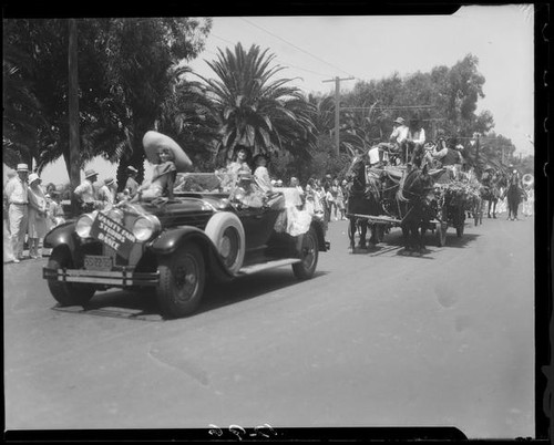 Decorated car and wagon with dancers, Santa Monica Pioneer Days parade, Santa Monica, 1930 or 1931