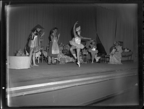 Lucille S. King, ventriloquist, on stage with four child actresses, 1951