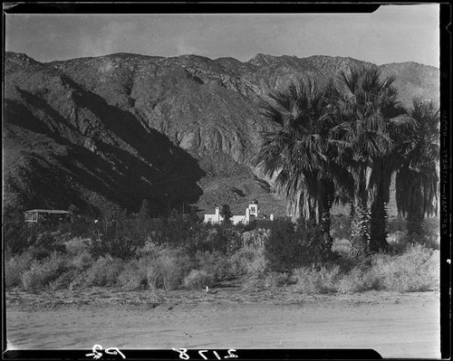 El Kantara, house with onion dome, horseshoe arches, and tiled roof, Palm Springs, [1925-1940?]