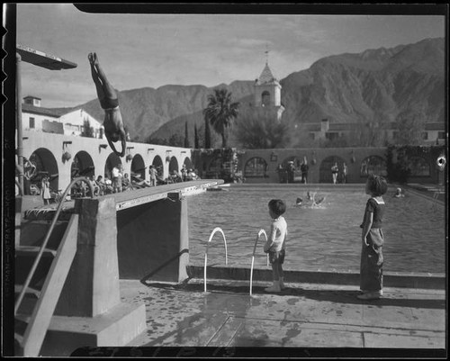 Dutch Smith diving into pool, El Mirador Hotel, Palm Springs, [1935?]