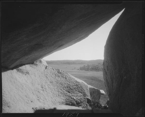 View from under rock formation or inside cave, Riverside County, [1920-1939?]