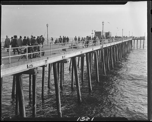 Pedestrians and fishermen, Santa Monica Pier, Santa Monica, [1920s?]