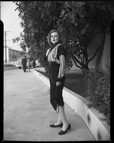 Performer with the Santa Monica Civic Opera in costume, Santa Monica, 1956