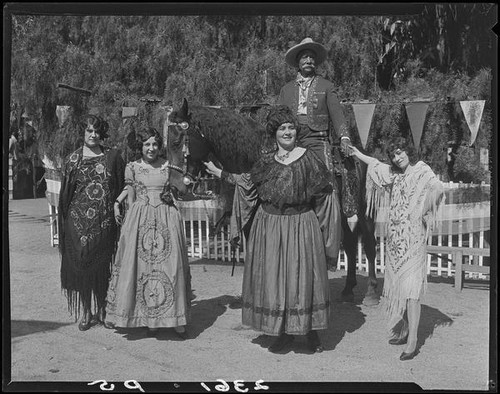 Eugene R. Plummer, on horseback, with 4 women, Hollywood, 1931