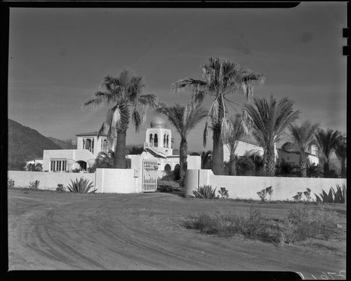 El Kantara, house with onion dome, horseshoe arches, and tiled roof, Palm Springs, [1930s or 1940s?]