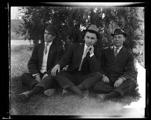 Adelbert Bartlett and 2 men, seated under tree, [1913?]