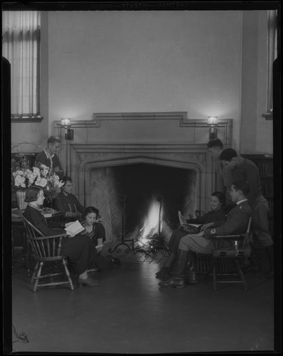 Students gathered around fireplace, Los Angeles High School, Los Angeles, 1932