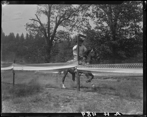 Rodeo rider performing, Lake Arrowhead Rodeo, Lake Arrowhead, 1929