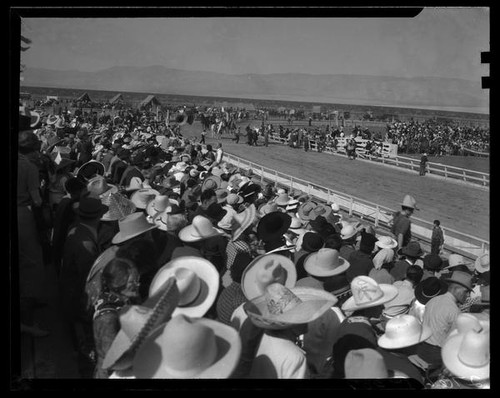 Mounted troop led by color guard, in parade at Palm Springs Field Club, Palm Springs, 1938